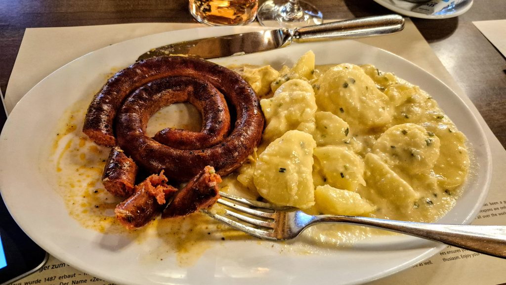 Zeughauskeller potato salad (with a spicy Hungarian paprika sausage on the side)