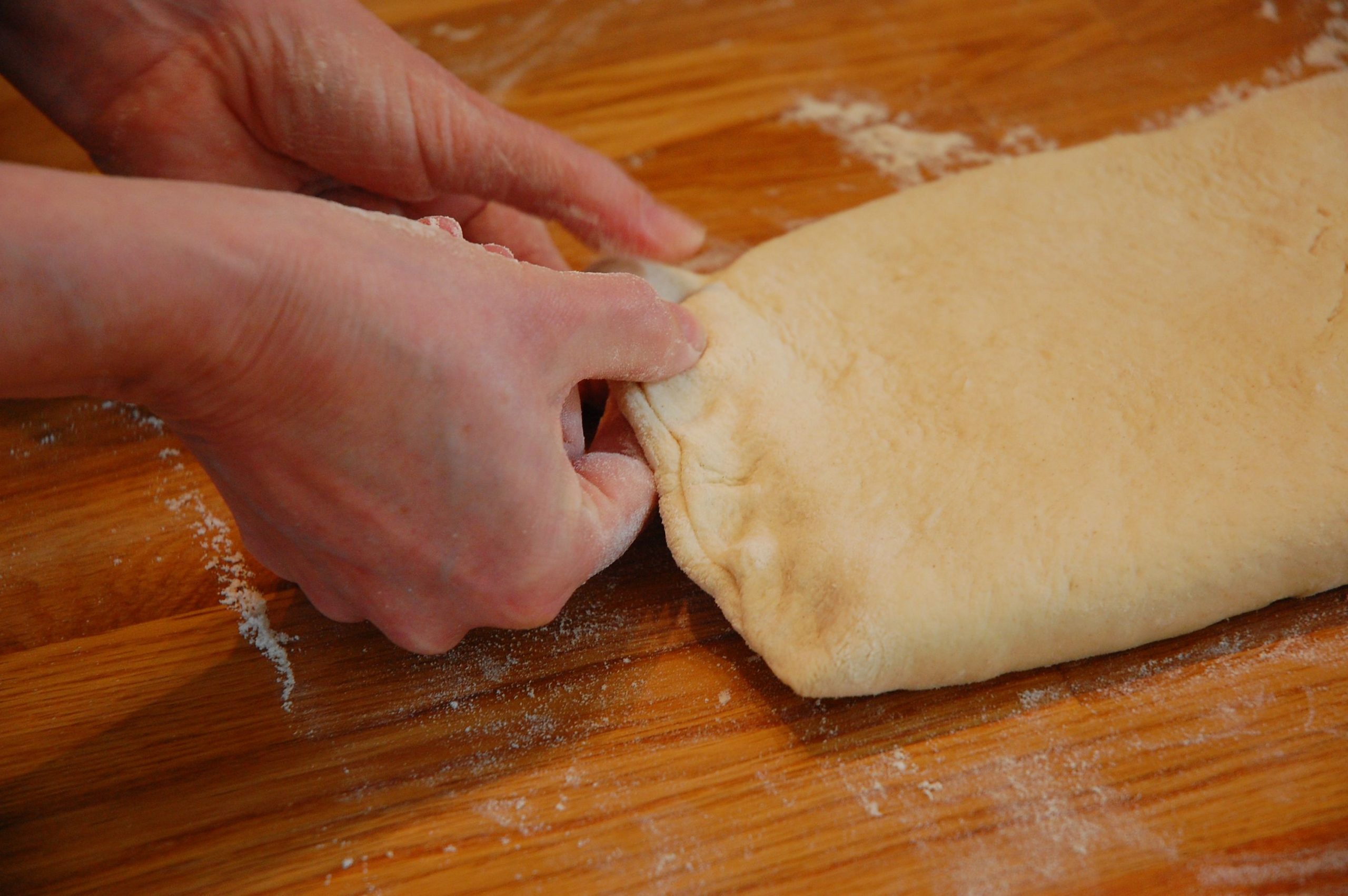 Pinching the rowie dough