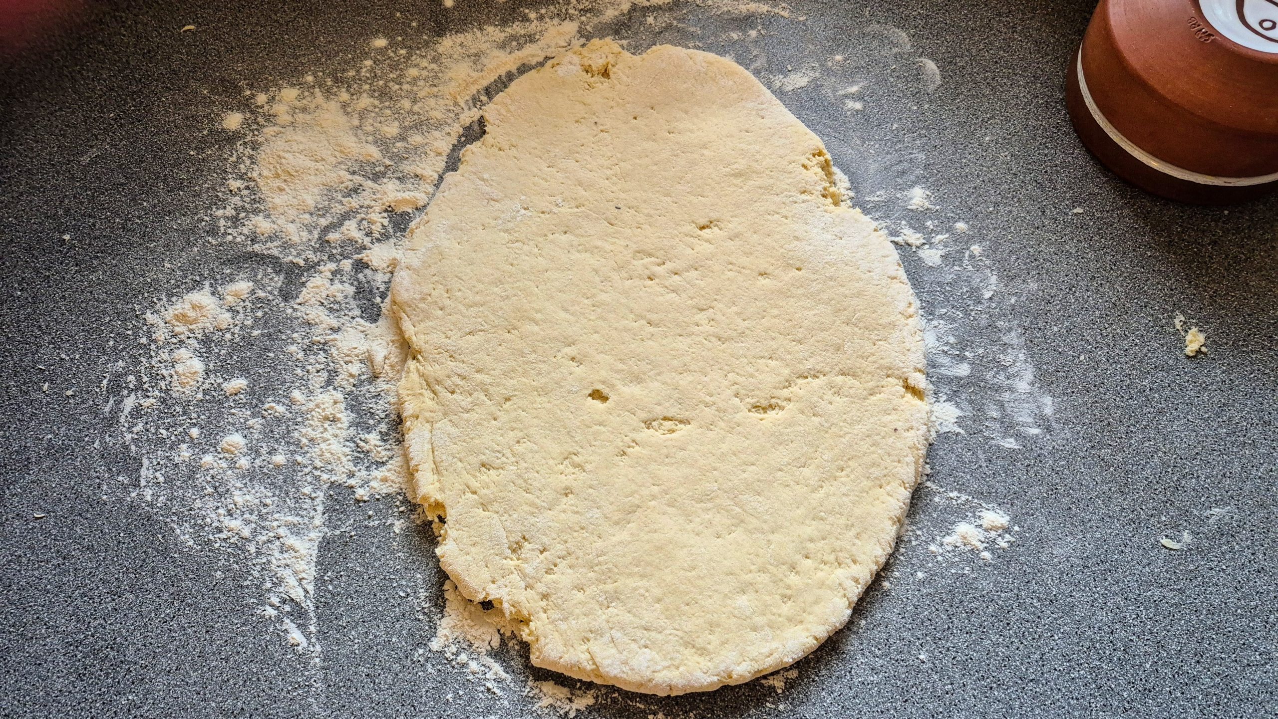 Rolled-out potato scone dough
