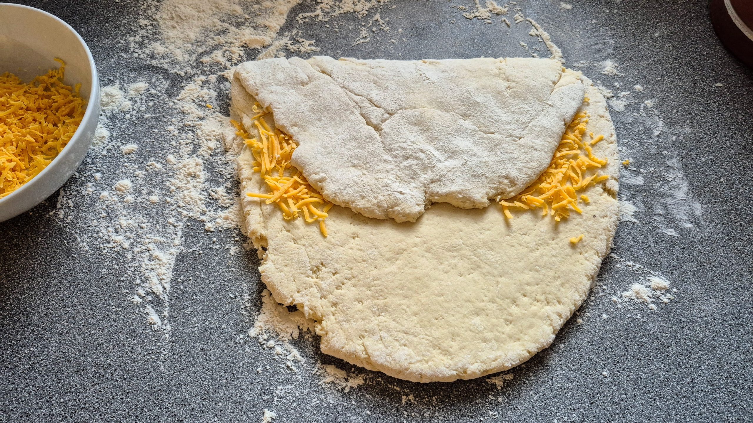 The top third of the scone dough folded down