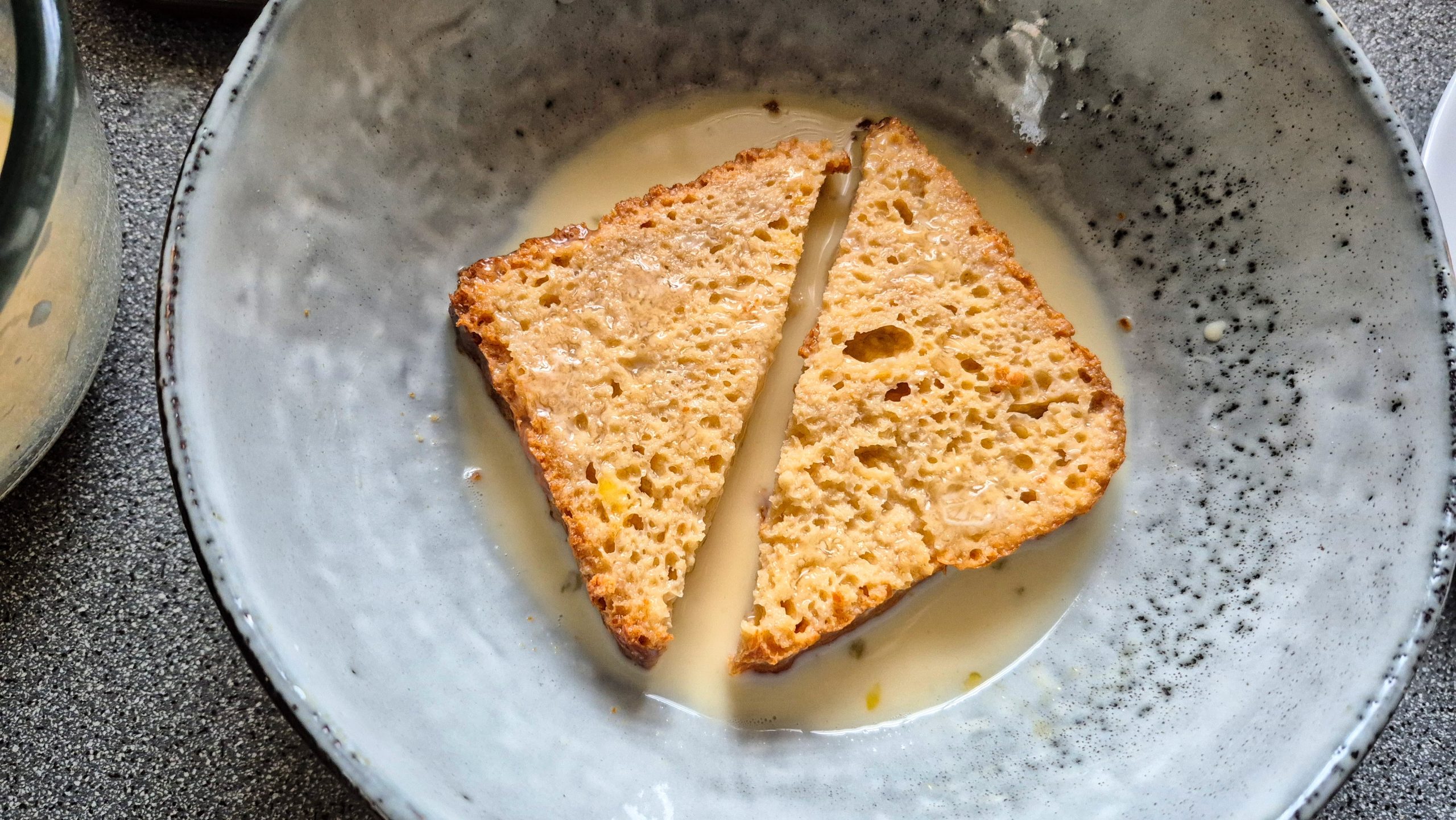 The bread soaking up the egg-and-milk mixture