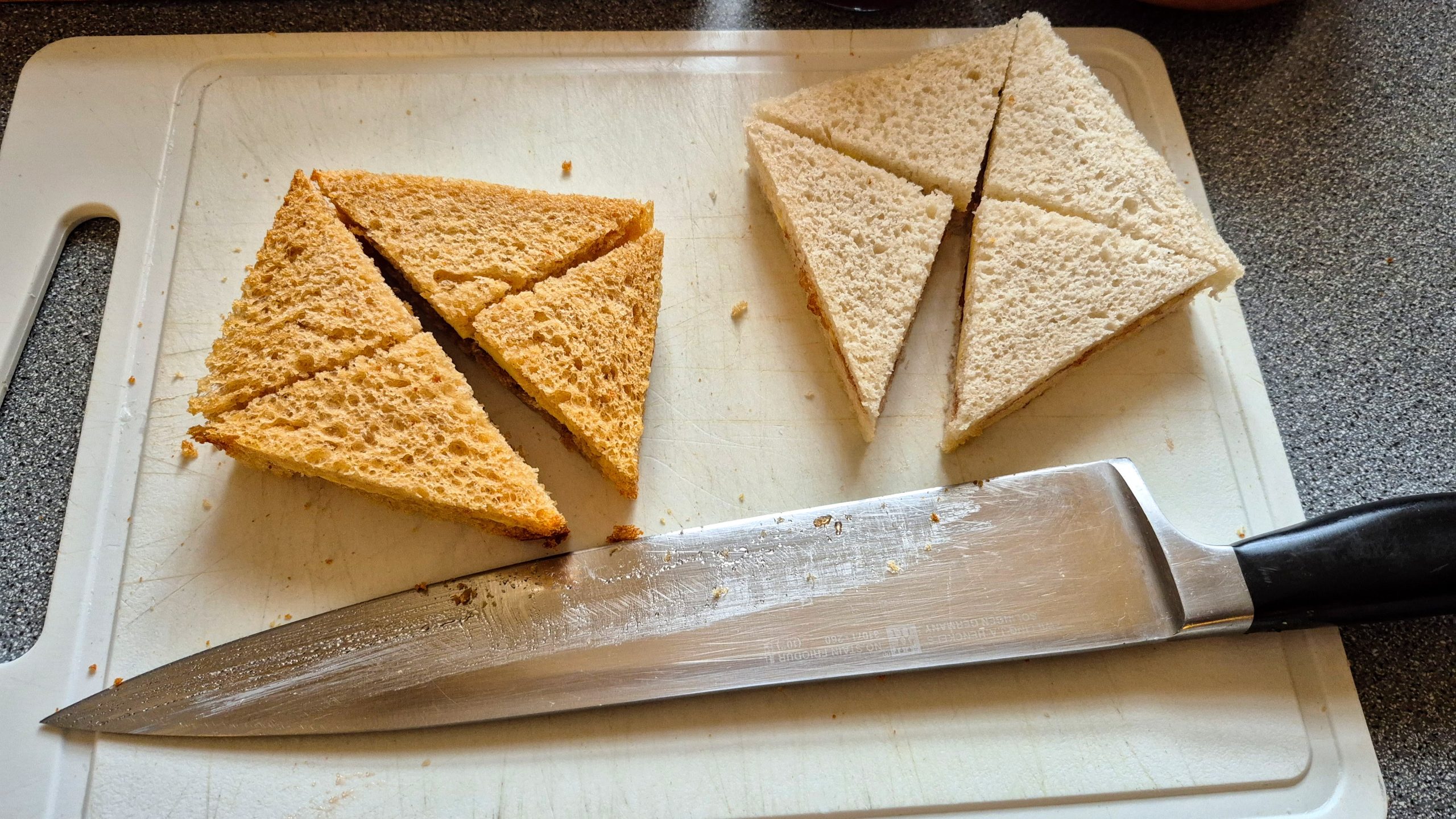 The sandwiches cut into triangles