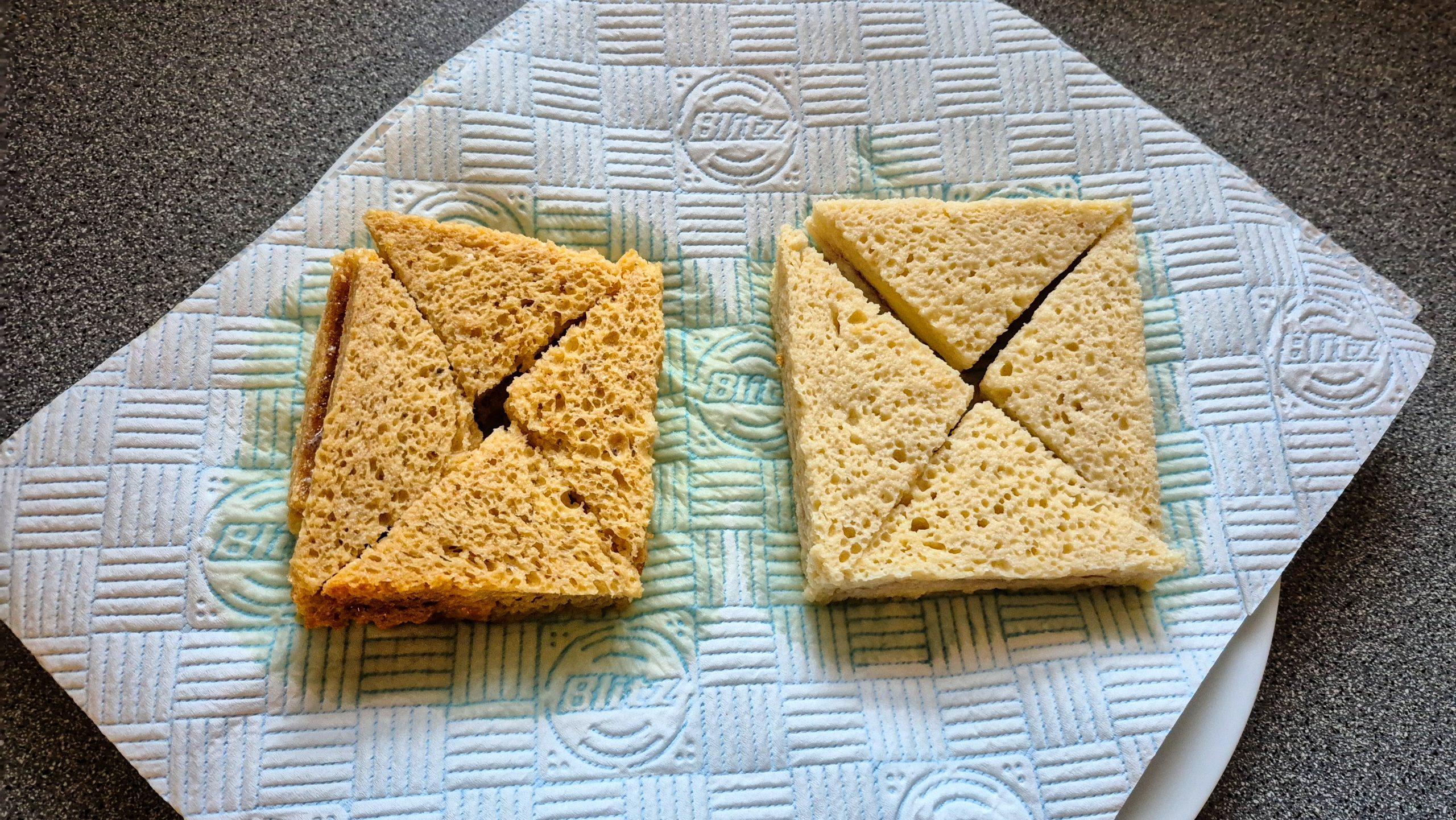 Sandwiches draining on paper towels