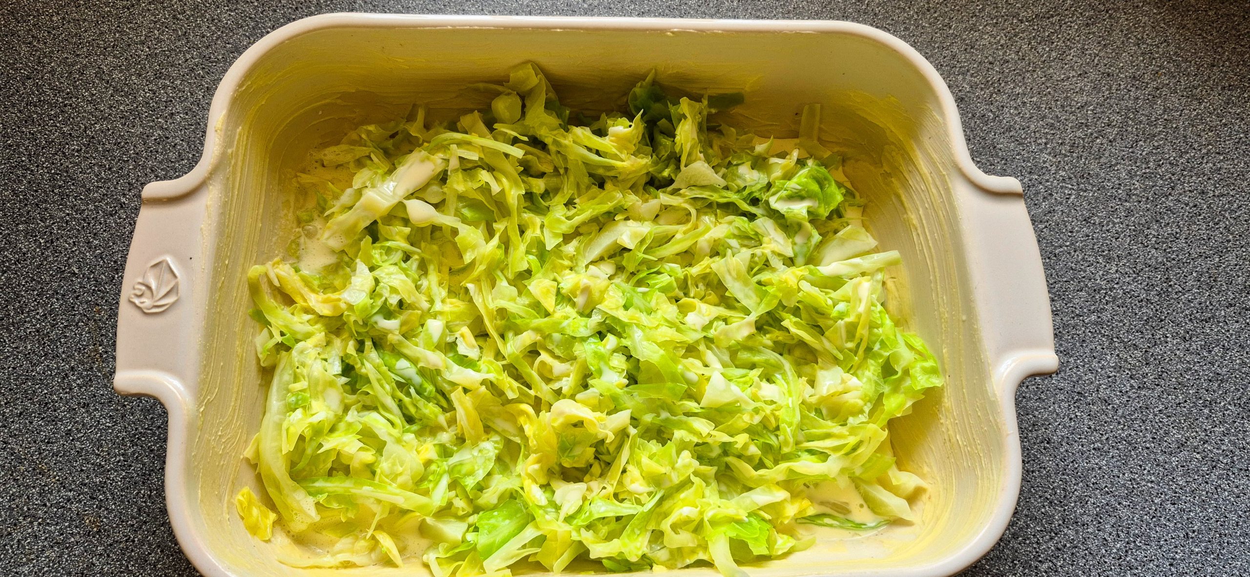 Blanched baby cabbage in the baking dish