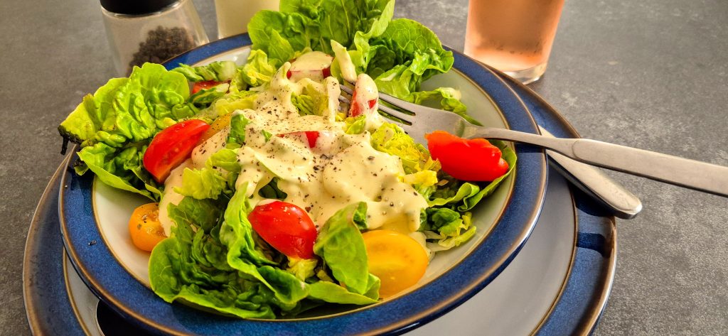 Swiss French Dressing on a salad of Little Gem lettuce and some cherry tomatoes